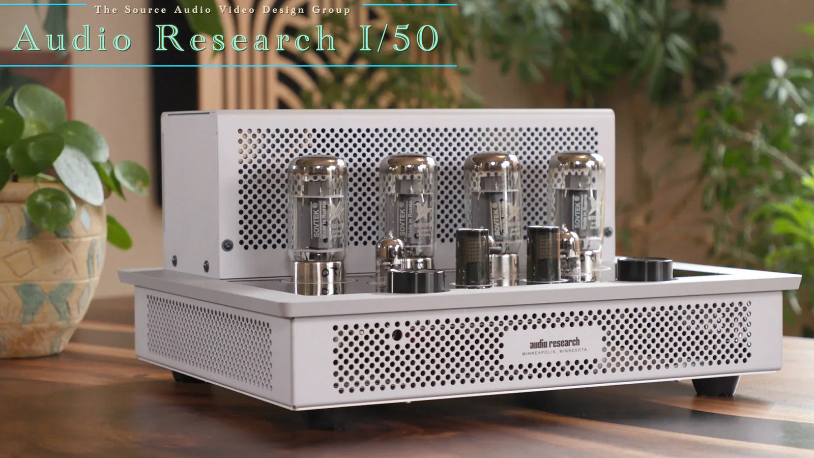 Audio Research I/50 silver tube amplifier on wooden table, high-end audio equipment at The Source AV