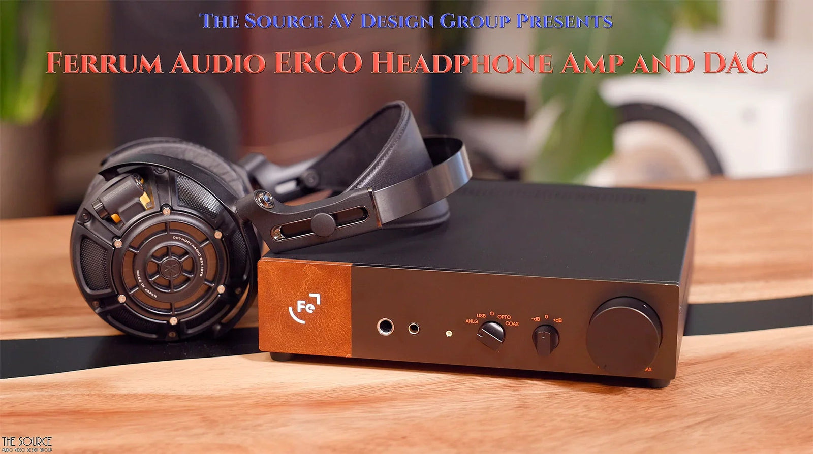 Ferrum Audio ERCO headphone amplifier and DAC with black headphones, displayed on wooden table at The Source AV.