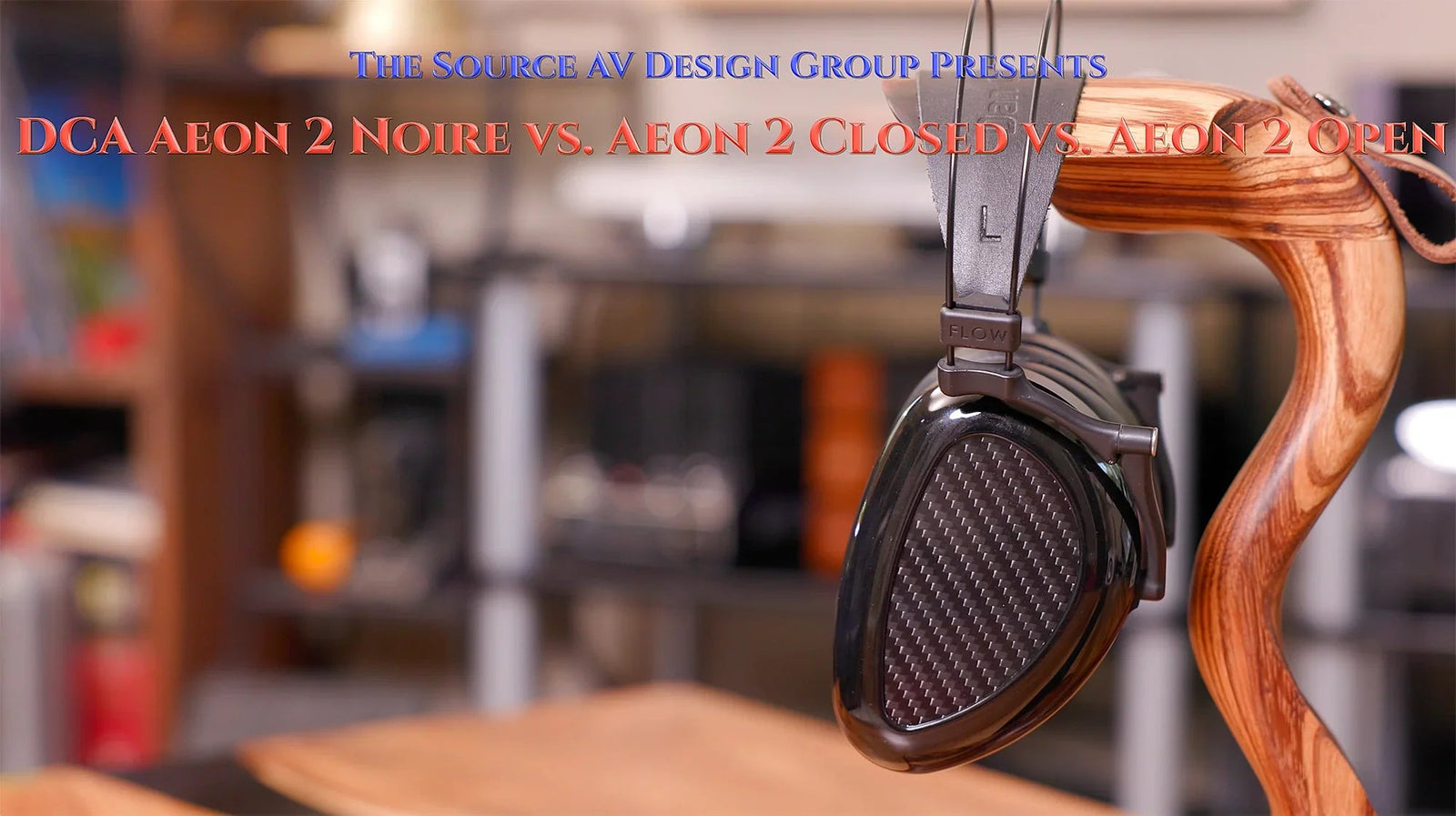 DCA Aeon 2 Noire headphones on wooden stand in audio store setting, The Source AV