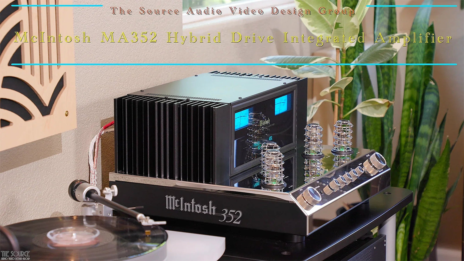McIntosh MA352 hybrid integrated amplifier on audio rack, with visible tubes and analog meters at The Source AV.
