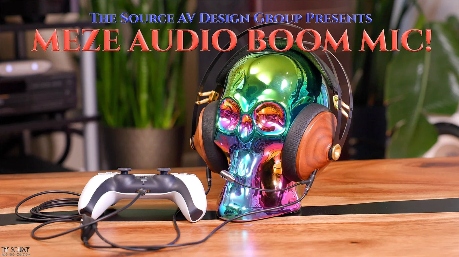 Meze Audio Boom Mic with headphones on iridescent skull stand and game controller, The Source AV