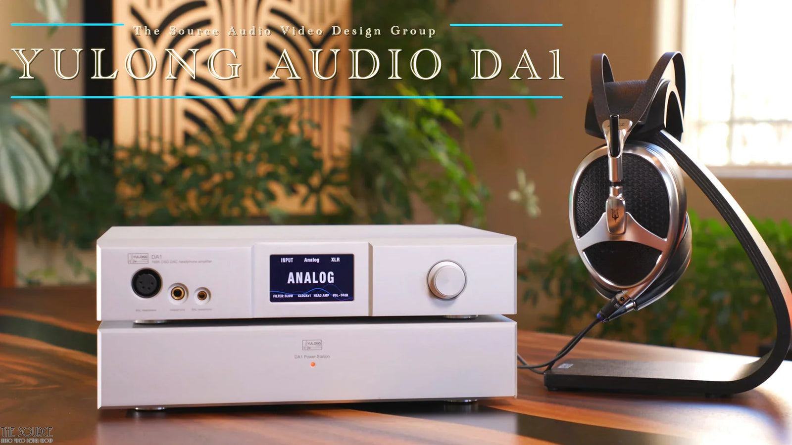 Yulong Audio DA1 headphone amplifier and DAC with headphones on stand, showcased by The Source AV.